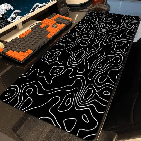 Tapis de bureau XXL Strata – Motif liquide noir & blanc, finition antidérapante